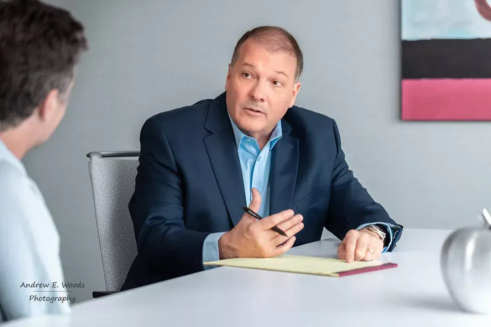Mark Shelby of Vertical Wealth Management with a client